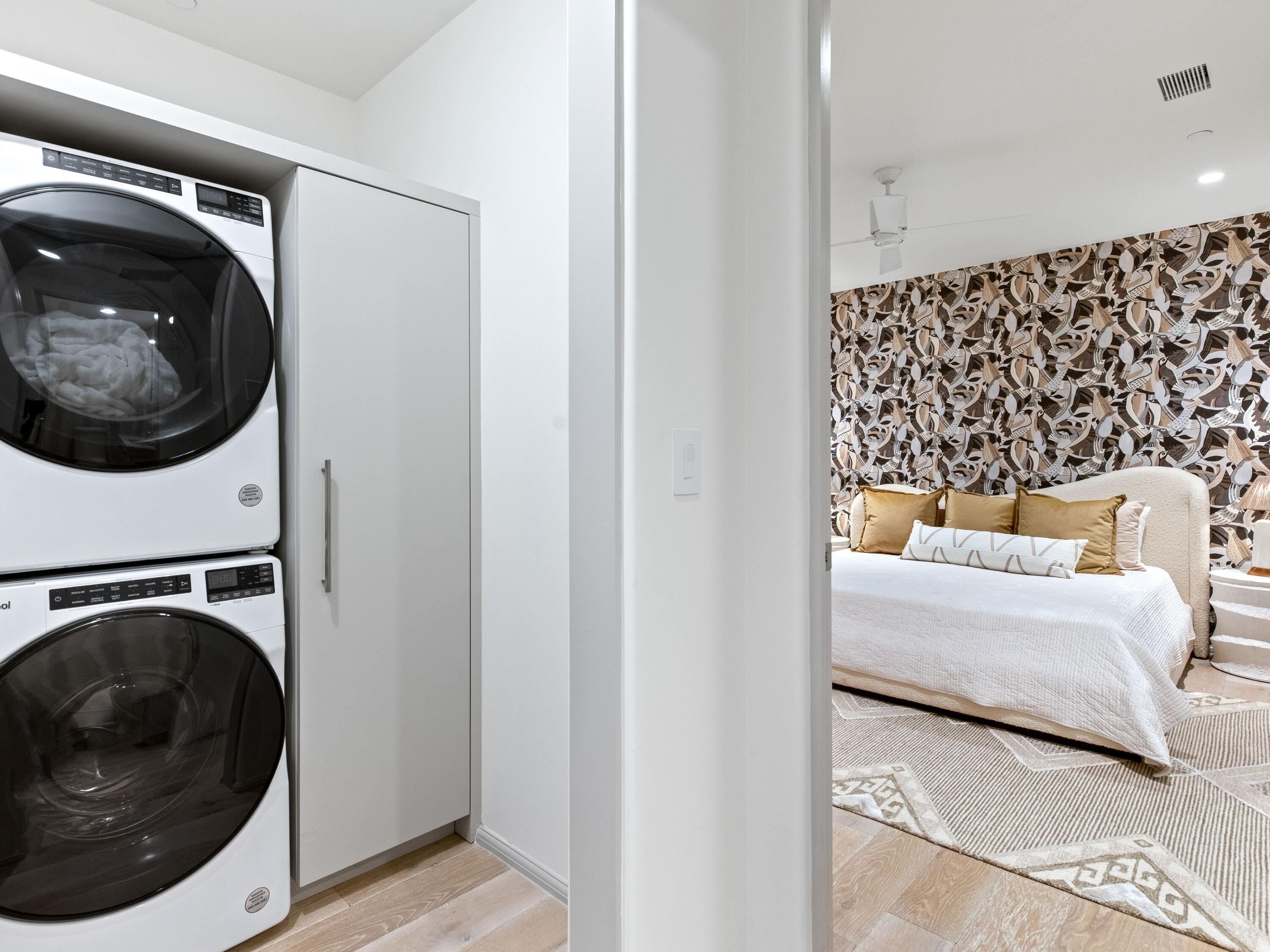 45 West Solaire Way Inlet Beach, Unit 103 Inlet Beach, FL 32461 - Photo 18 of 25 a utility room with dryer and washer