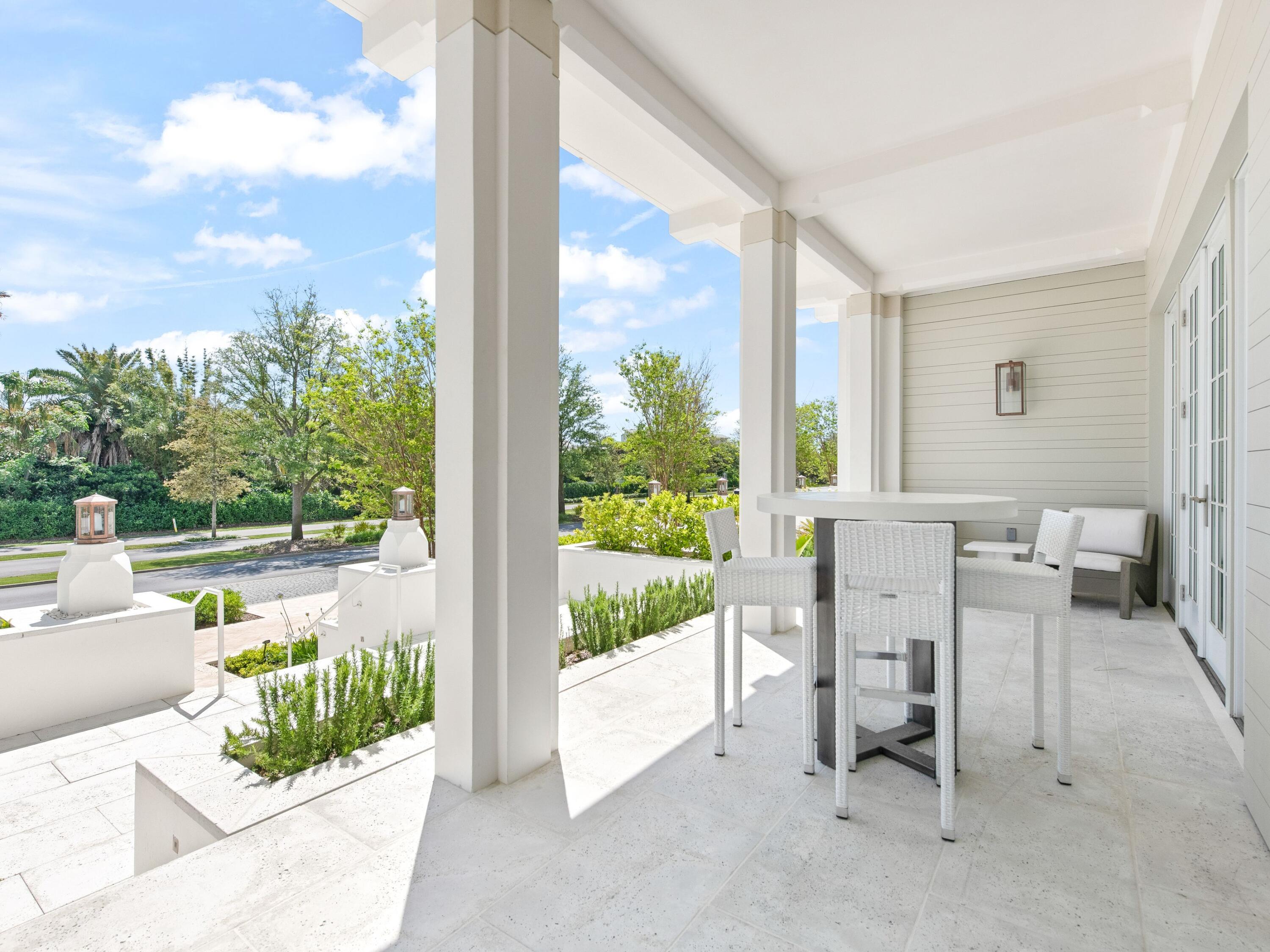 45 West Solaire Way Inlet Beach, Unit 103 Inlet Beach, FL 32461 - Photo 6 of 25 a front view of a house with garden