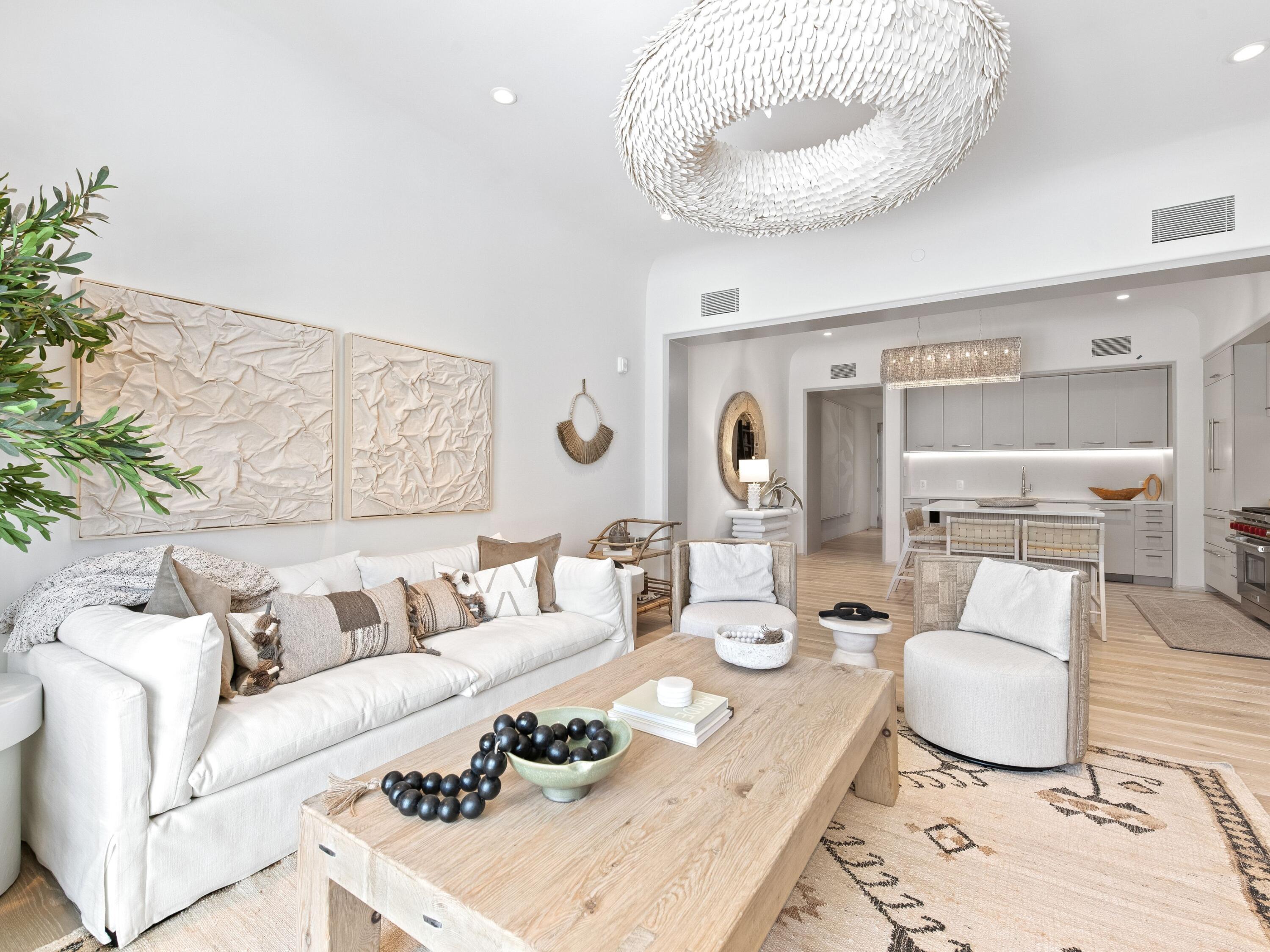 45 West Solaire Way Inlet Beach, Unit 103 Inlet Beach, FL 32461 - Photo 7 of 25 a living room with furniture and a wooden floor