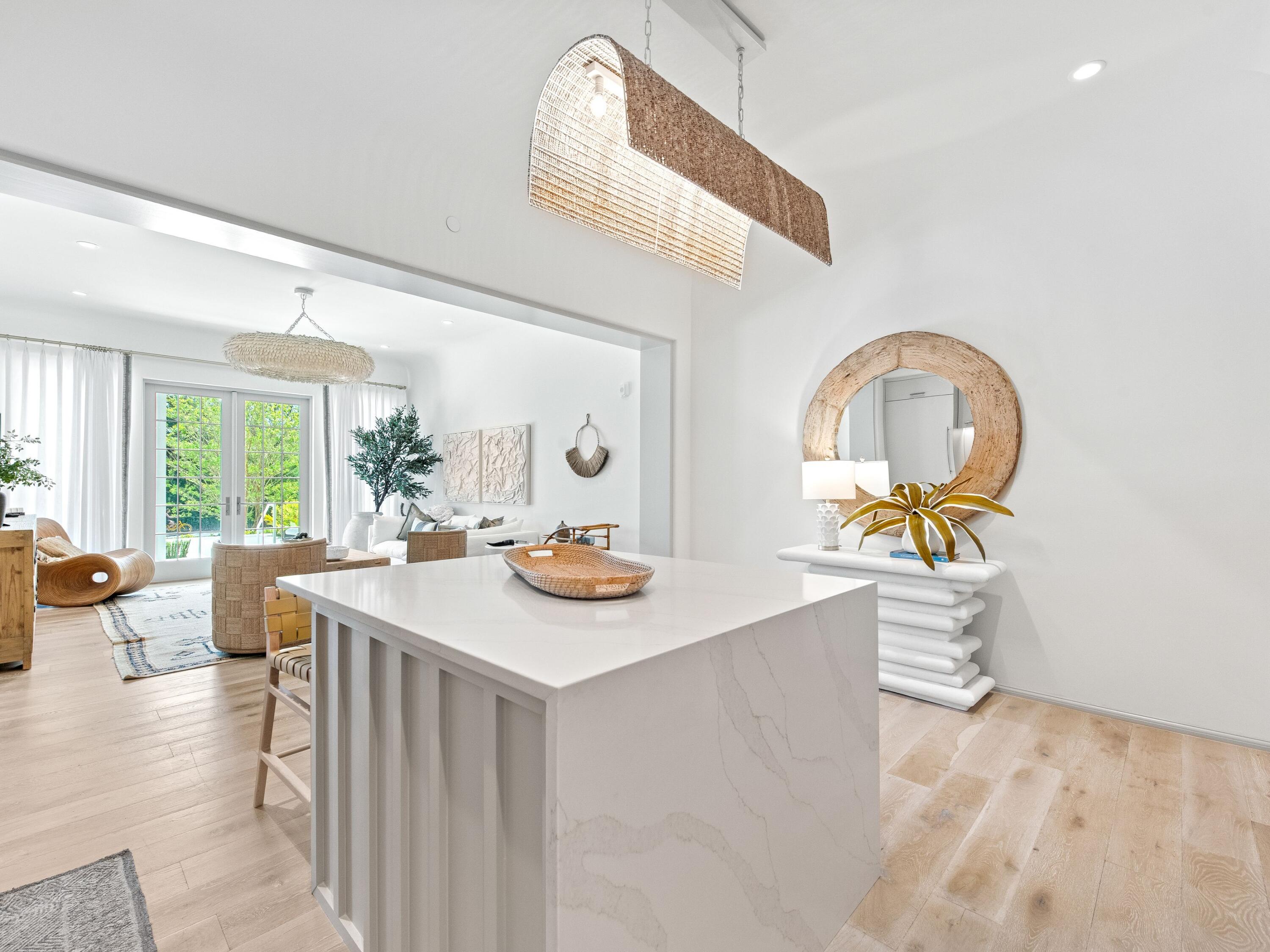 45 West Solaire Way Inlet Beach, Unit 103 Inlet Beach, FL 32461 - Photo 8 of 25 a view of a kitchen area living room and dining room