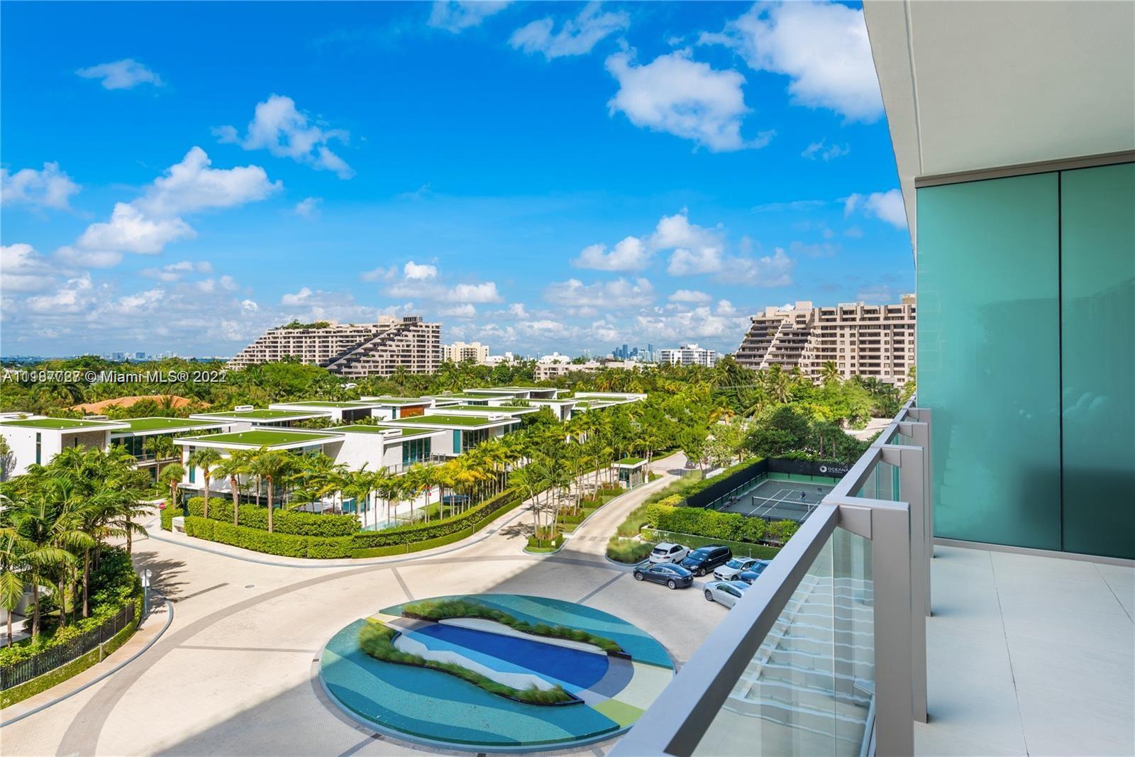 360 Ocean Drive, Unit 603S Key Biscayne, FL 33149 - Photo 12 of 29 a view of a balcony with chairs