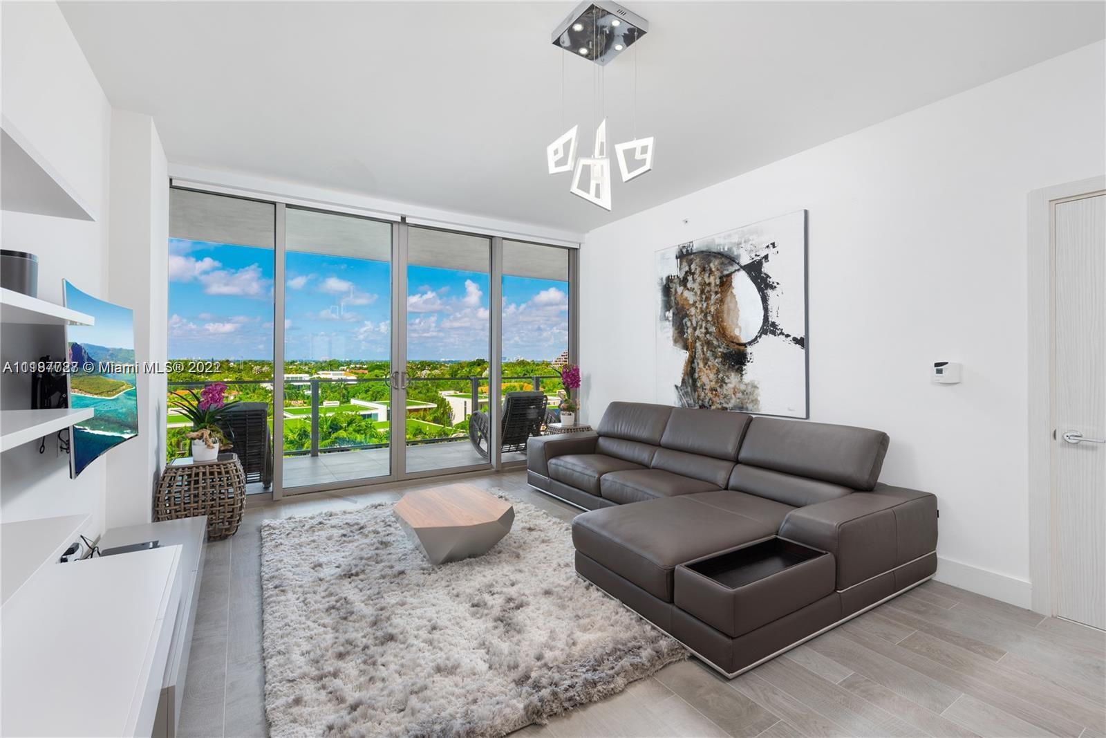 360 Ocean Drive, Unit 603S Key Biscayne, FL 33149 - Photo 5 of 29 a living room with furniture