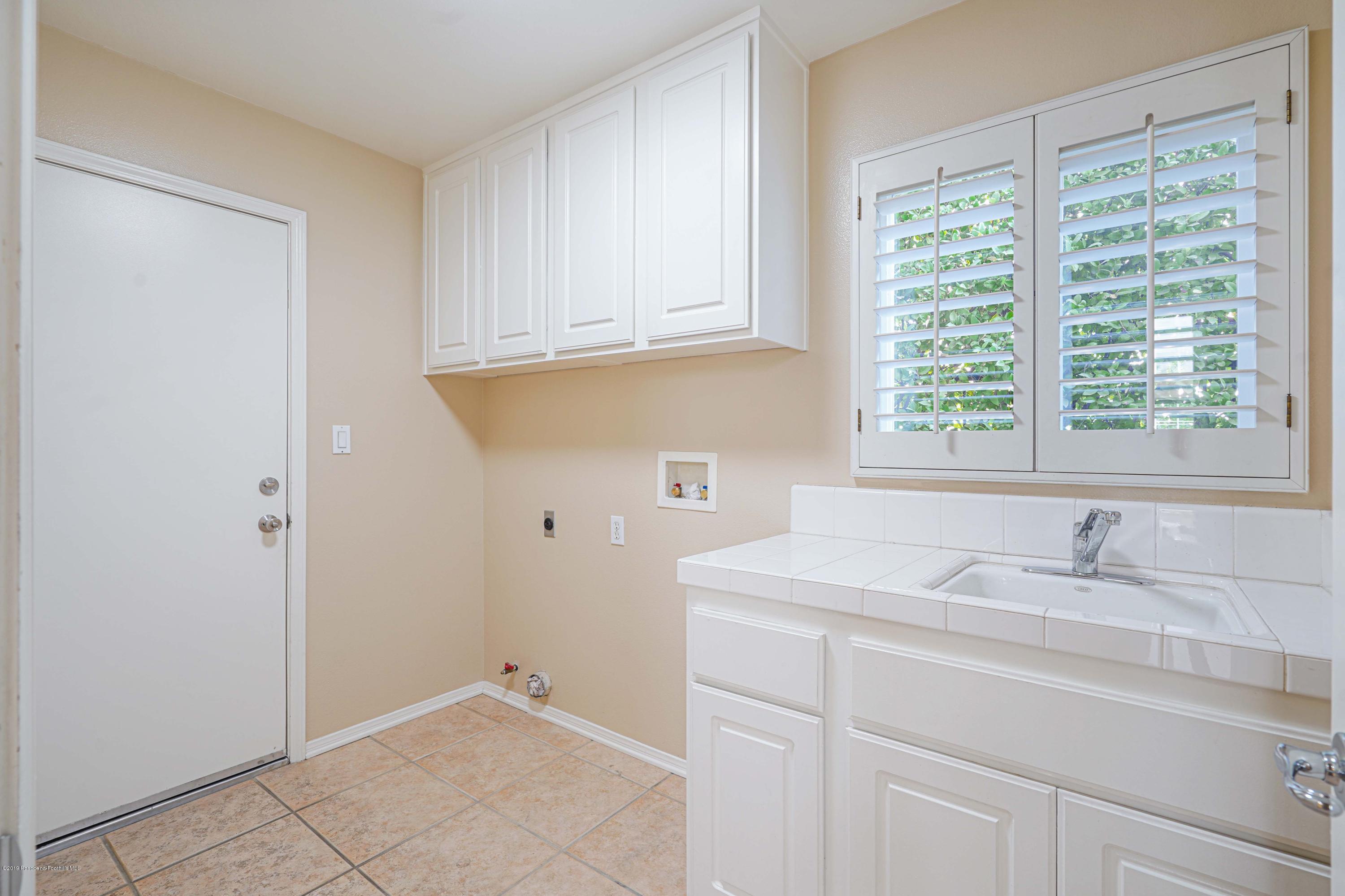 20548 Bergamo Way Porter Ranch, CA 91326 - Photo 21 of 58 a bathroom with a sink and a bathtub