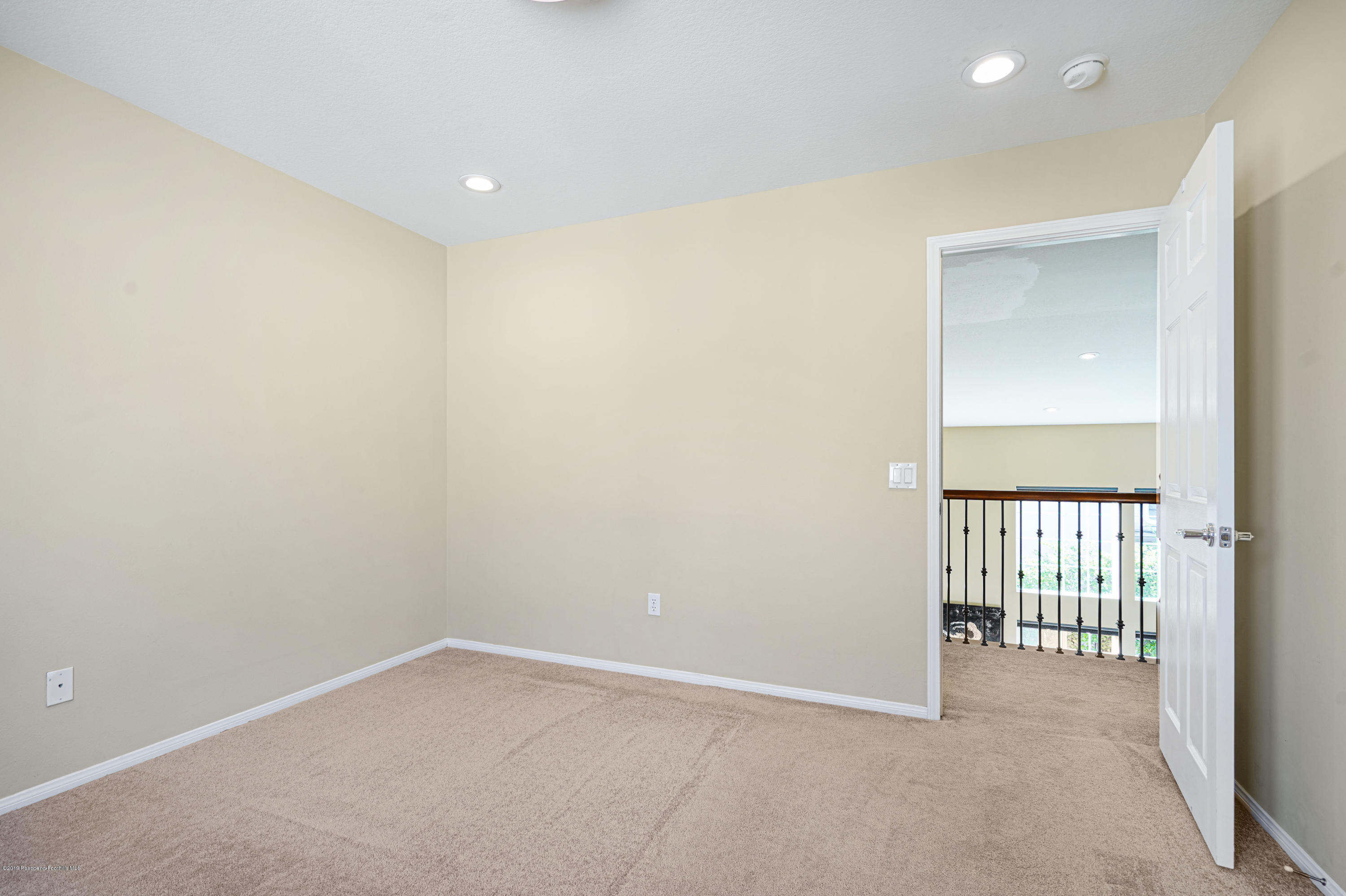 20548 Bergamo Way Porter Ranch, CA 91326 - Photo 26 of 58 an empty room with a empty space and a window