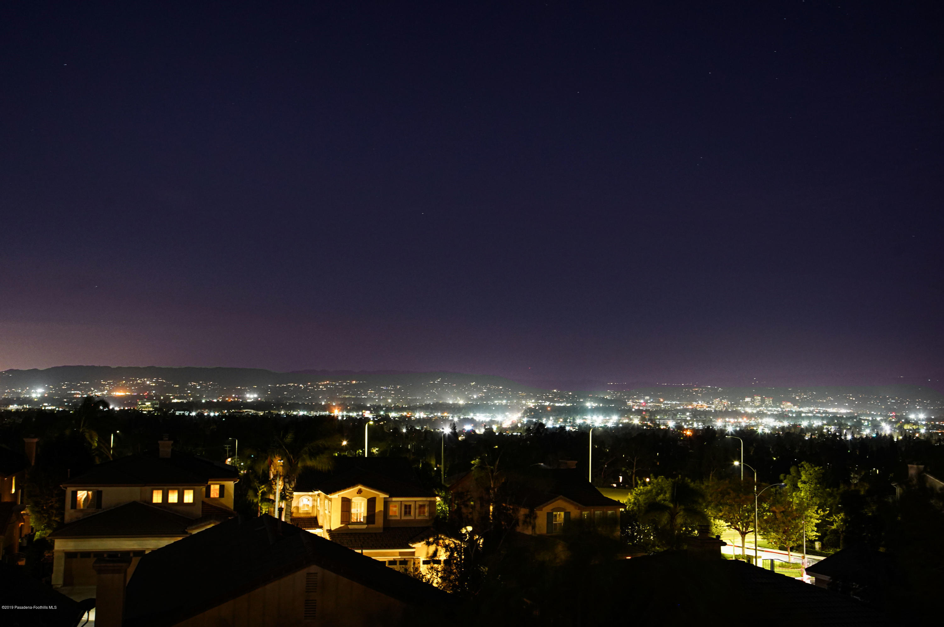 20548 Bergamo Way Porter Ranch, CA 91326 - Photo 57 of 58 a view of a city street