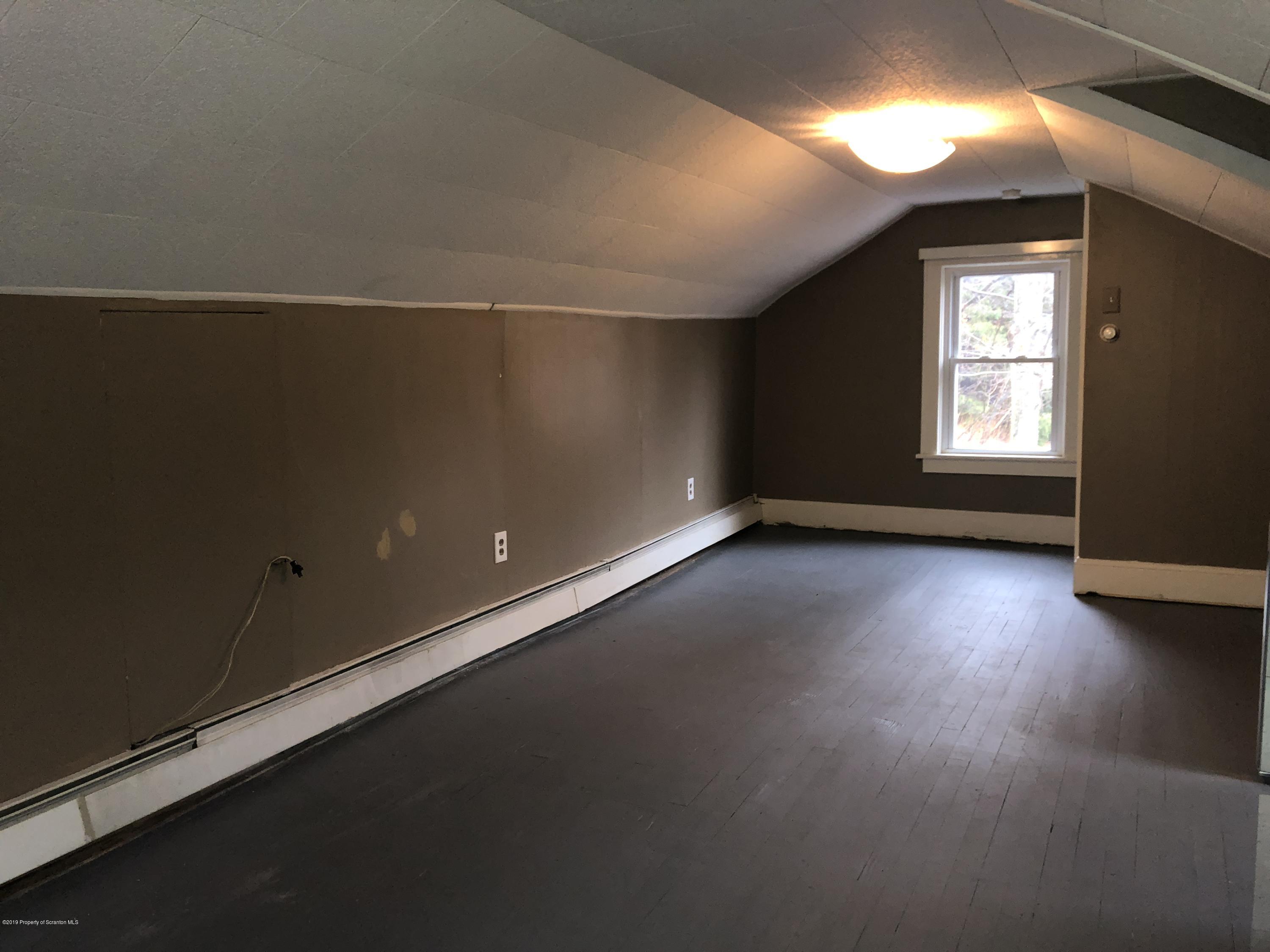 495 Cortez Road Lake Ariel, PA 18436 - Photo 11 of 39 an empty room with a window