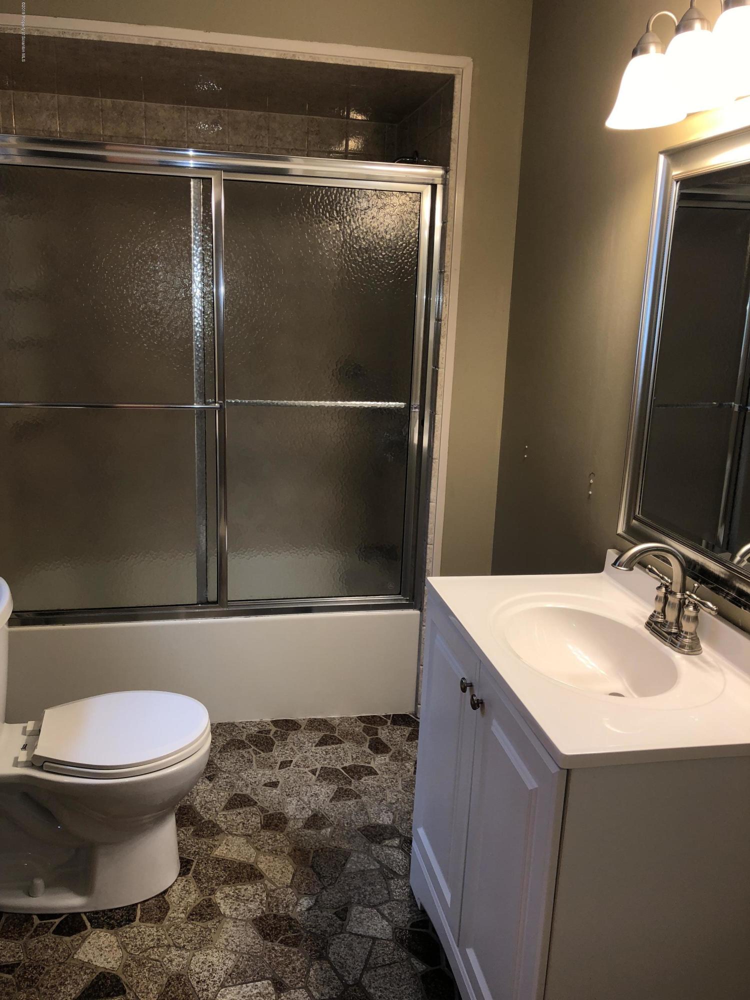 495 Cortez Road Lake Ariel, PA 18436 - Photo 12 of 39 a bathroom with a sink toilet and shower