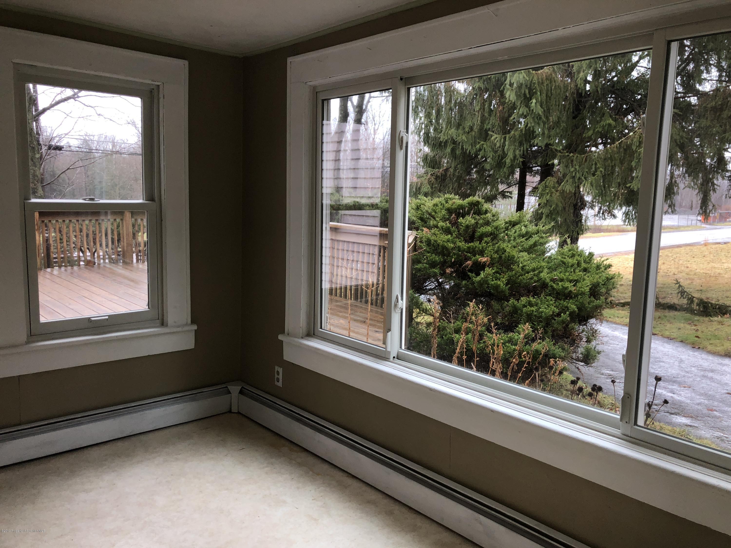 495 Cortez Road Lake Ariel, PA 18436 - Photo 17 of 39 a view of a living room and a window