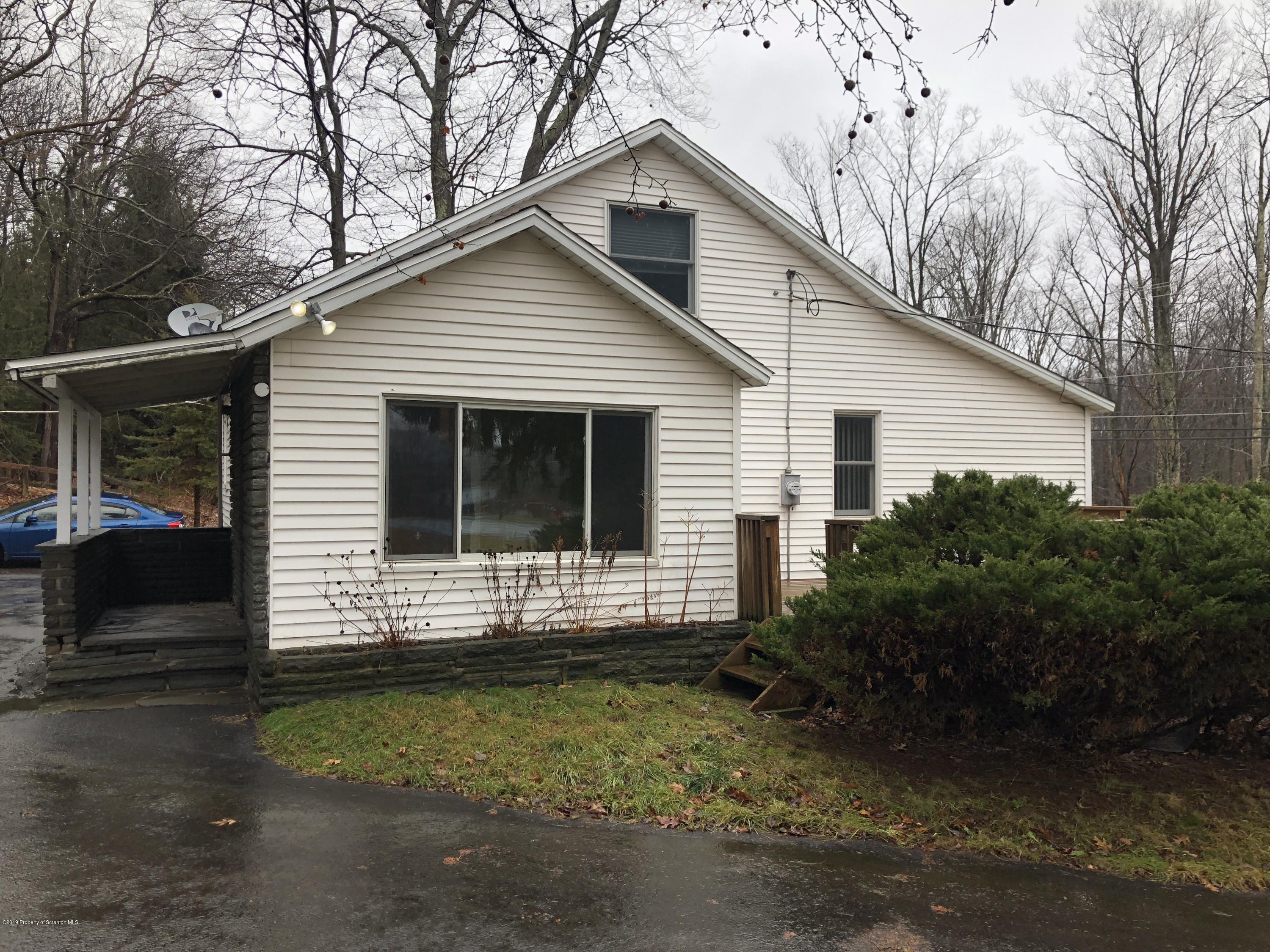 495 Cortez Road Lake Ariel, PA 18436 - Photo 27 of 39 a view of front of house with a yard