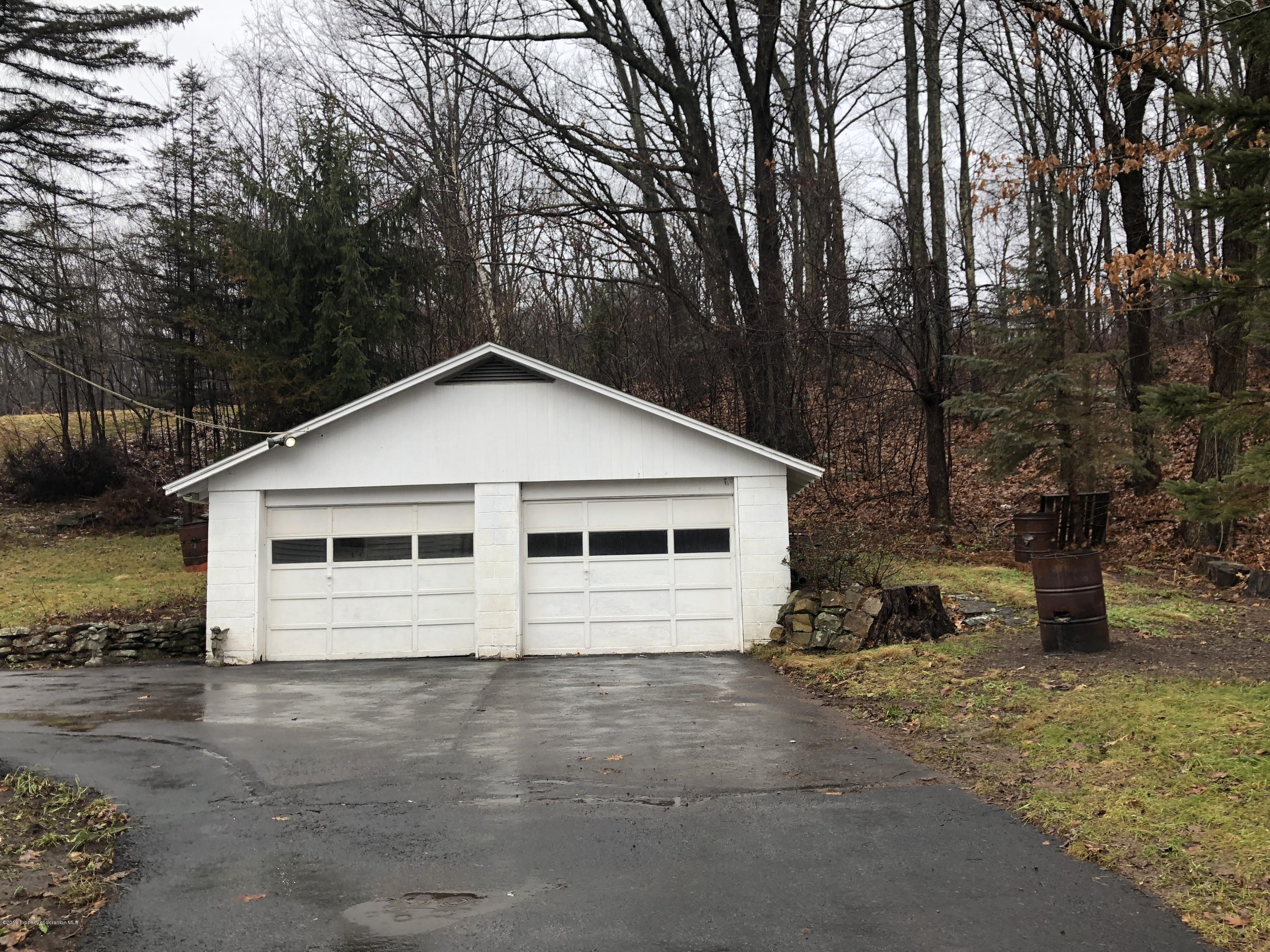 495 Cortez Road Lake Ariel, PA 18436 - Photo 29 of 39 a view of a house with a yard