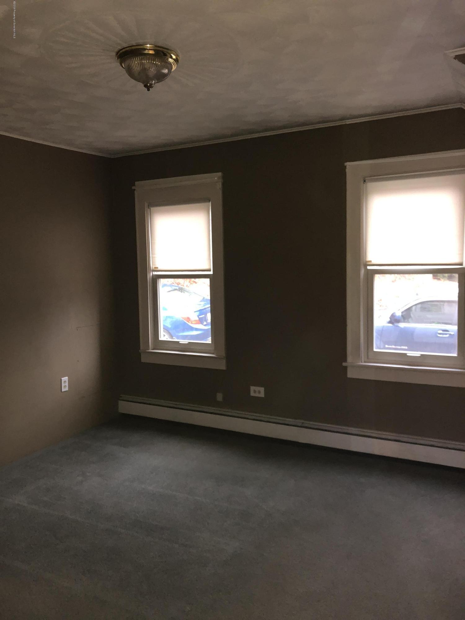 495 Cortez Road Lake Ariel, PA 18436 - Photo 9 of 39 an empty room with a window