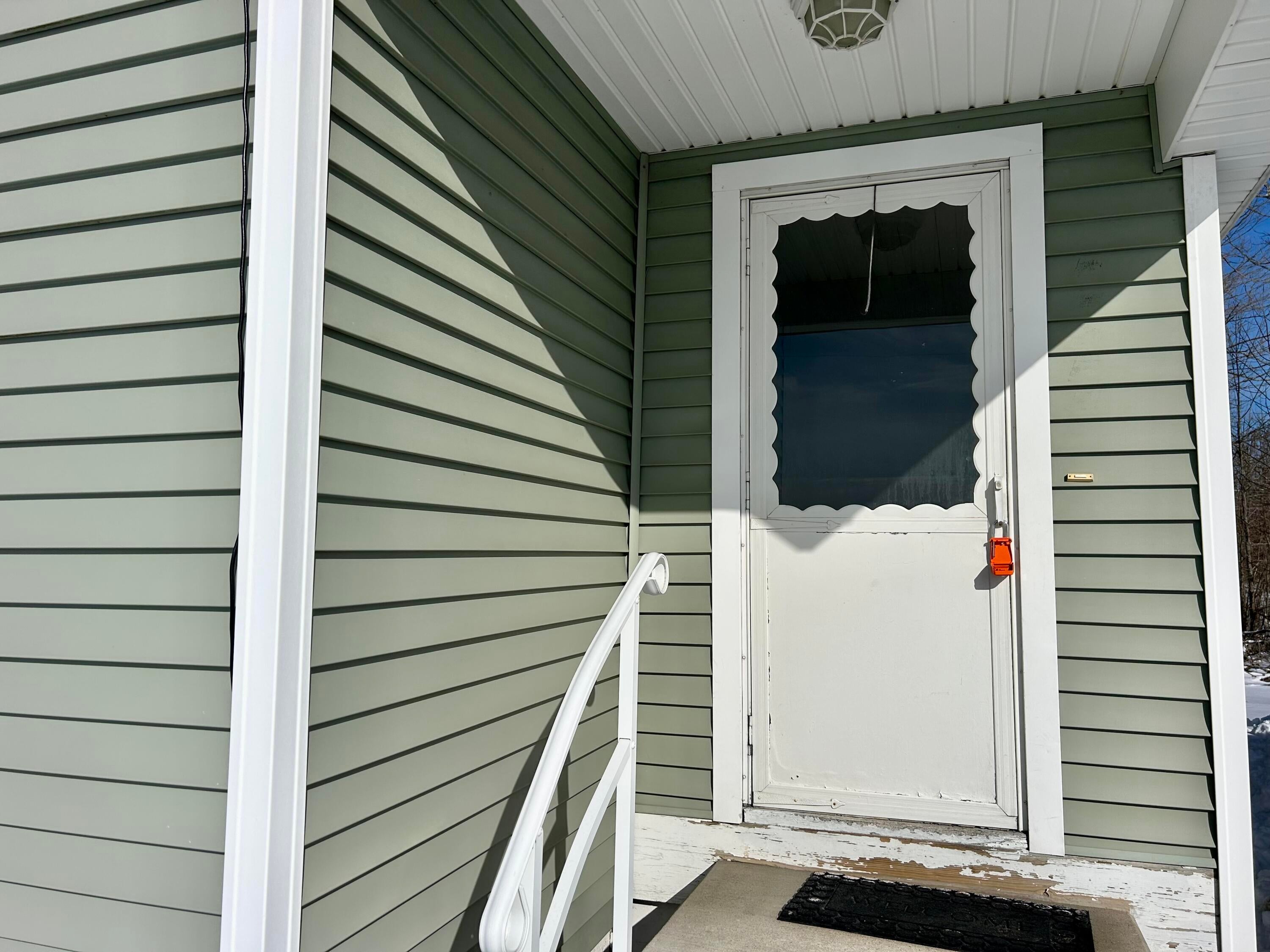 11825 Meridian Line Road Johannesburg, MI 49751 - Photo 12 of 45 Covered Front Entry