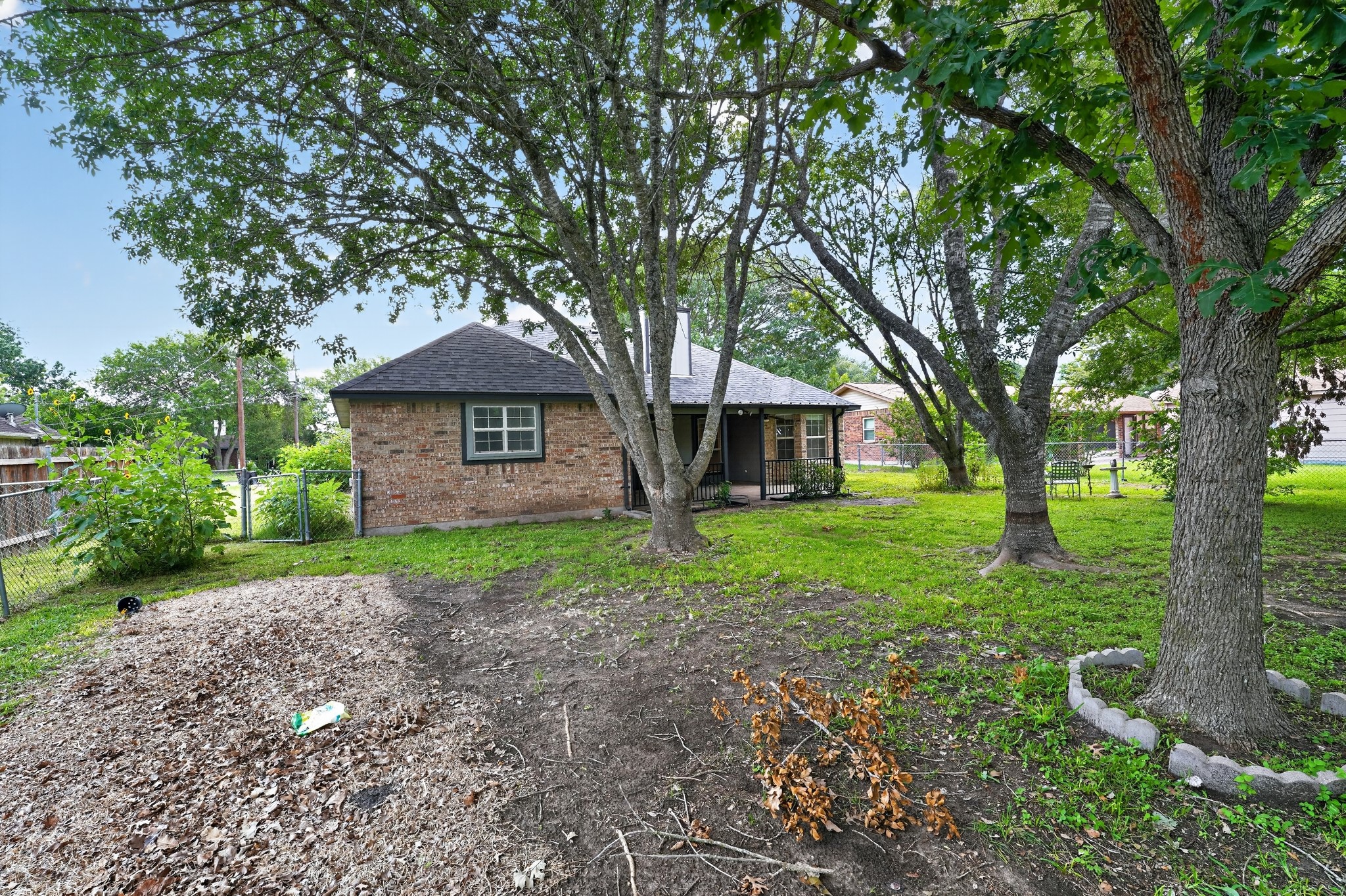 102 Hummingbird Lane Lockhart, TX 78644 - Photo 29 of 30 Large, shady, beautiful trees, back yard