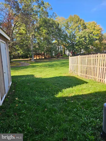 a view of a house with a big yard