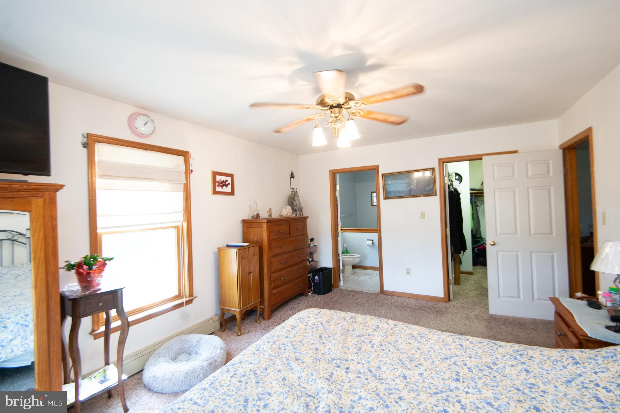 6010 Todds Point Road Cambridge, MD 21613 - Photo 27 of 52 a view of a livingroom with furniture and a flat screen tv