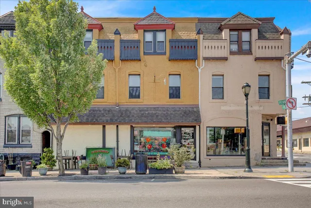 a view of a building with a street