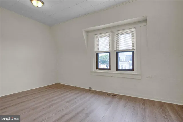 an empty room with a window
