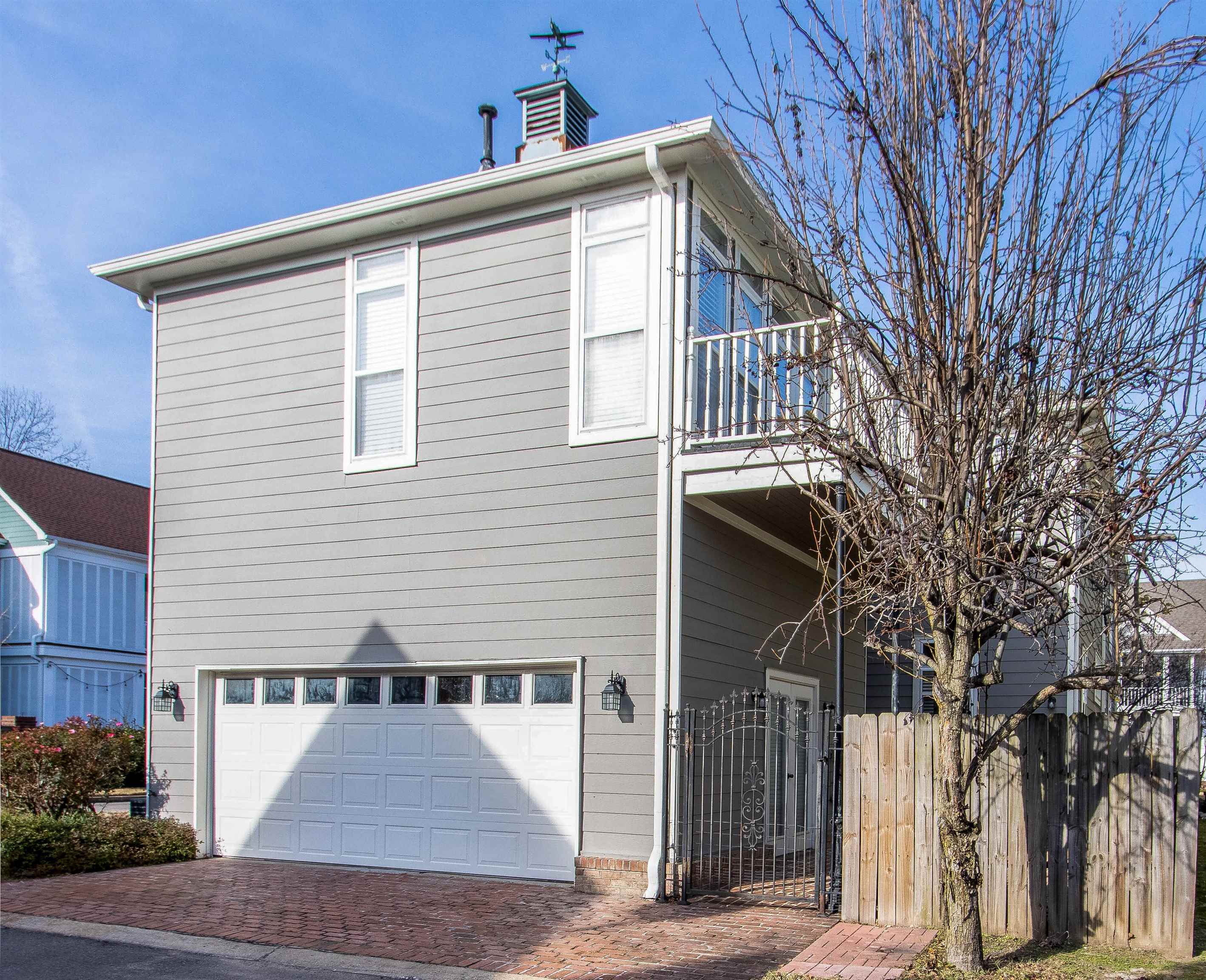 137 Harbor Point Lane, Unit STUDIO Memphis, TN 38103 - Photo 11 of 11 a view of a house with a street