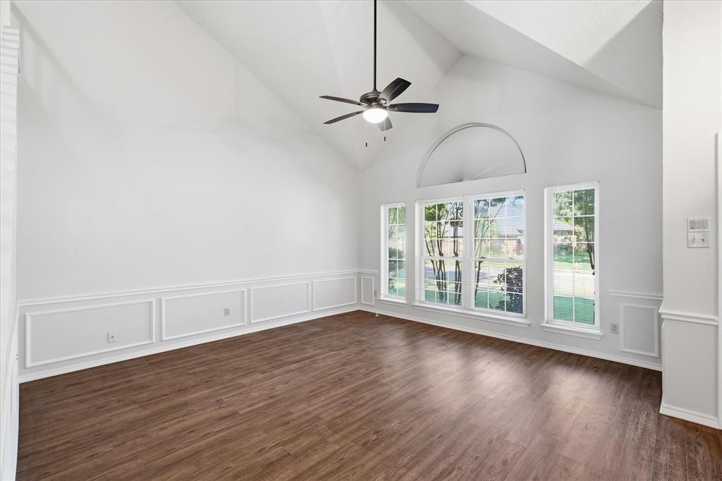 318 Lodge Road Coppell, TX 75019 - Photo 7 of 35 The open, airy living room showcases tall ceilings, natural light and a spacious layout designed for effortless relaxation.