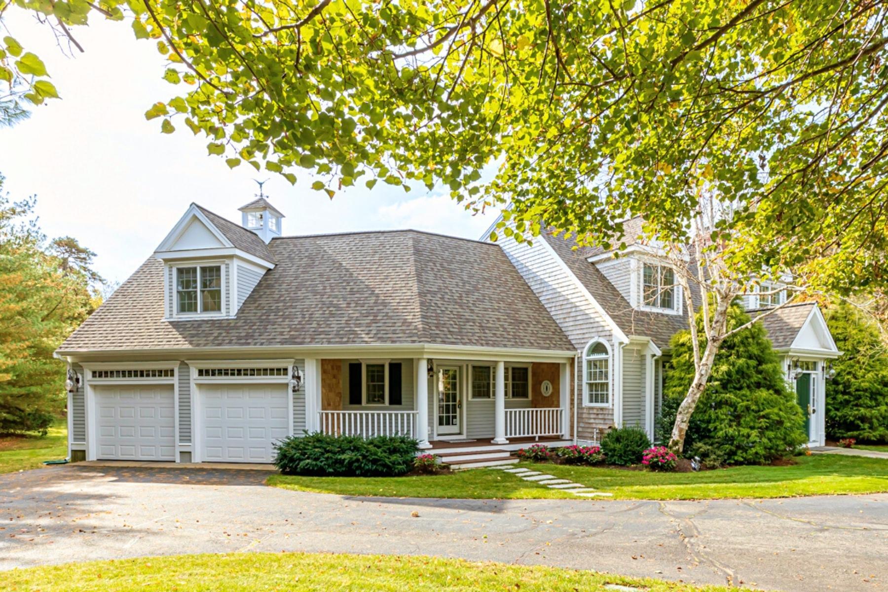 47 Farm Valley Road Osterville, MA 02655 - Photo 2 of 57 a front view of a house with a yard