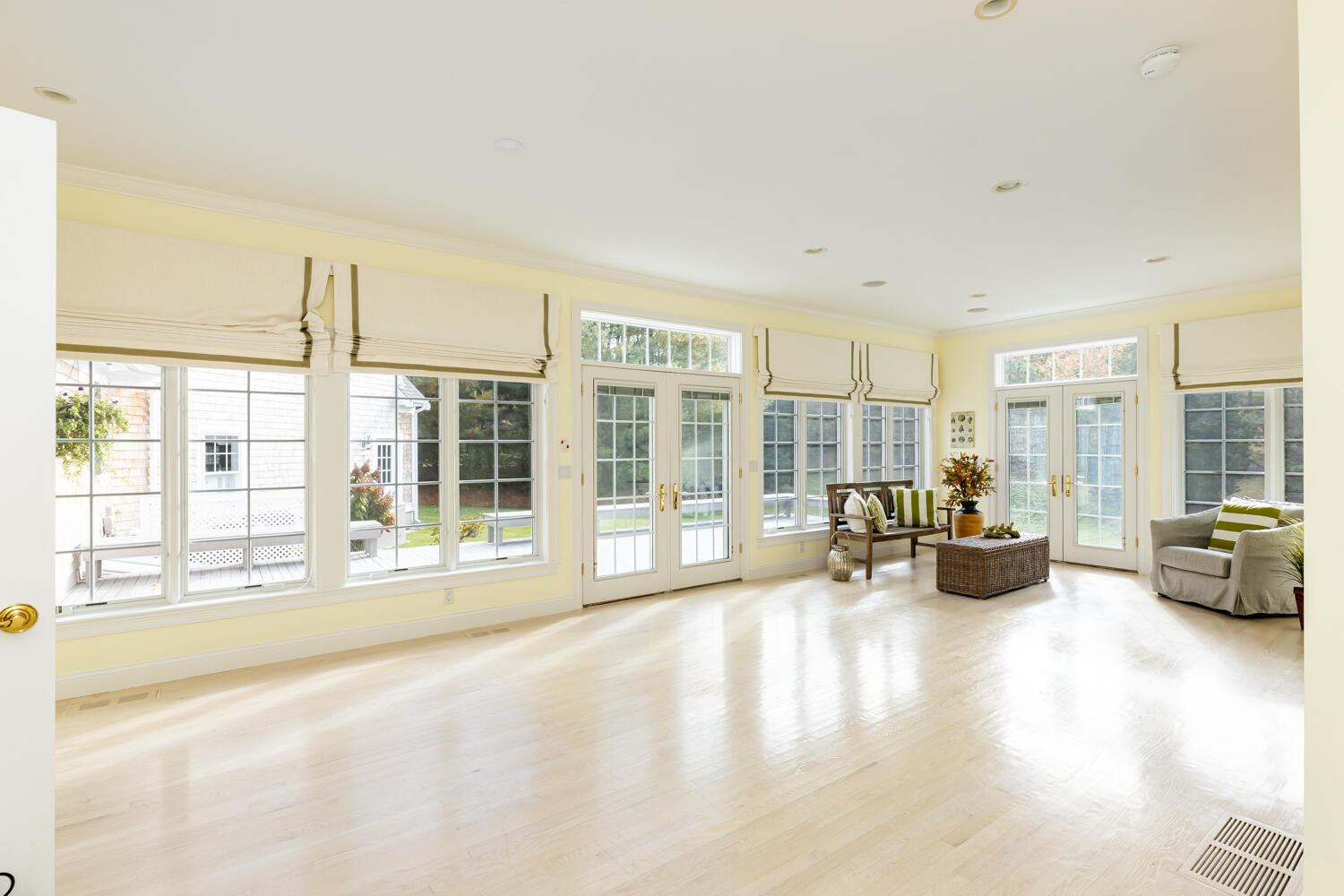 47 Farm Valley Road Osterville, MA 02655 - Photo 25 of 57 a living room with furniture and a large window with balcony view