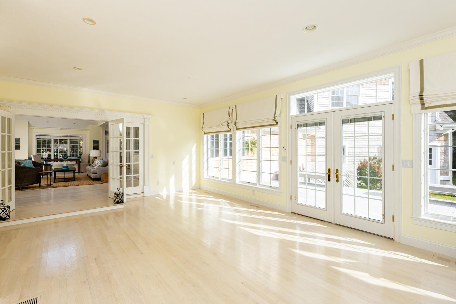 47 Farm Valley Road Osterville, MA 02655 - Photo 26 of 57 a view of a livingroom with wooden furniture and windows
