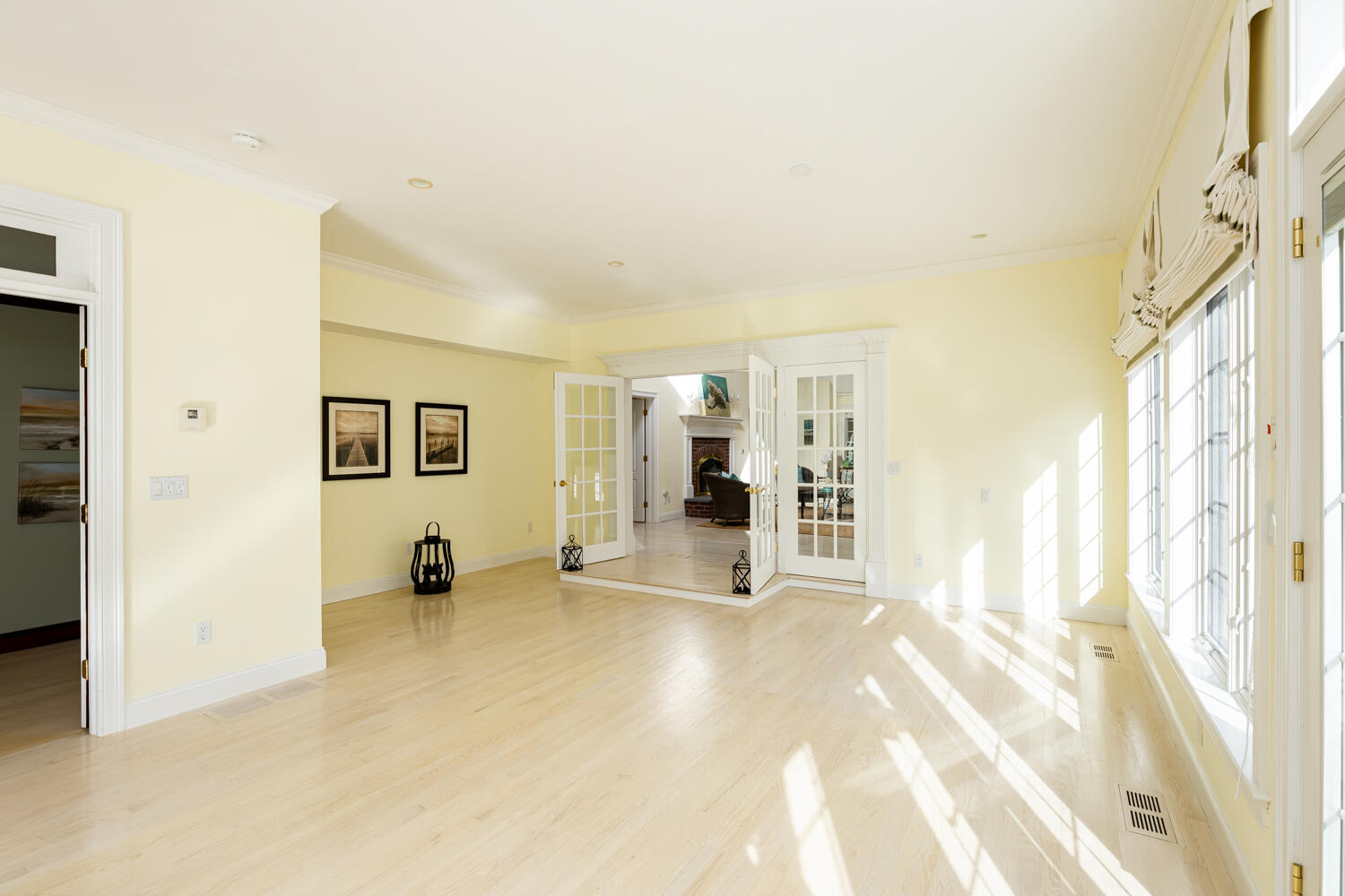 47 Farm Valley Road Osterville, MA 02655 - Photo 27 of 57 a view of a big room with wooden floor and windows