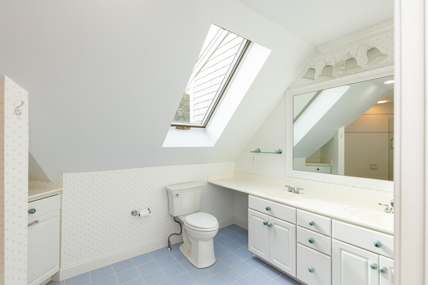 47 Farm Valley Road Osterville, MA 02655 - Photo 48 of 57 a bathroom with a toilet sink and mirror