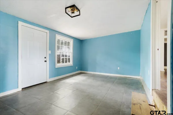 an empty room with windows
