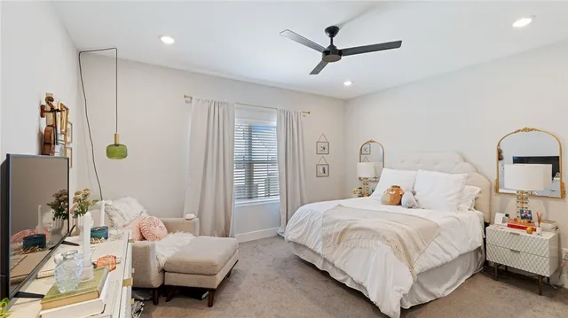 a bedroom with a bed and a walk in closet