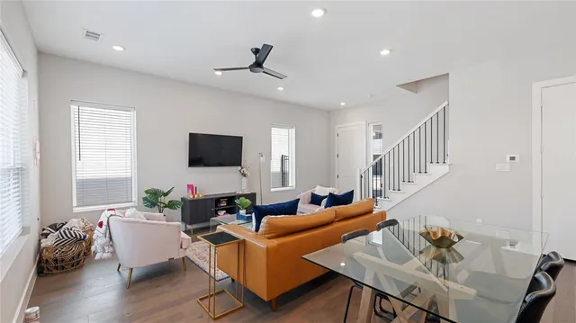 a large kitchen with kitchen island a sink appliances and a counter top space