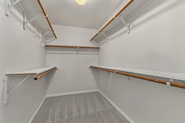 a view of a room with racks on the wall