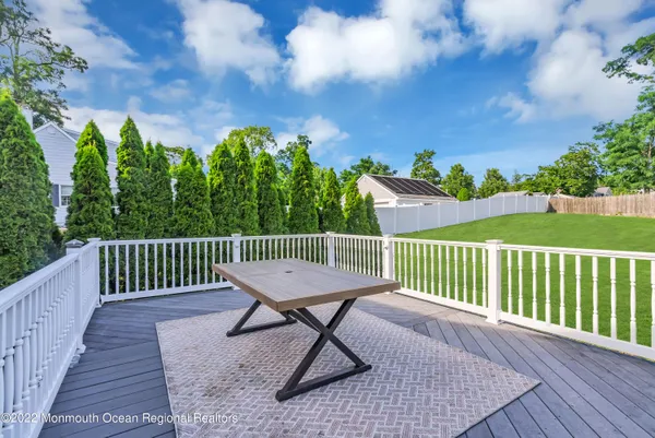 a view of a chairs on a roof deck