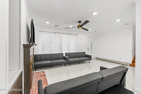 a living room with furniture and a window