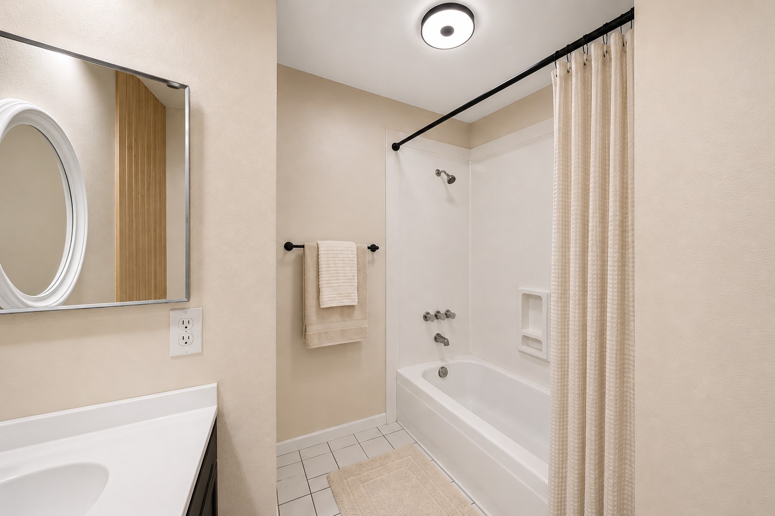 4818 Quailgate Drive Spring, TX 77373 - Photo 15 of 26 a bathroom with a bathtub a shower a sink and a window