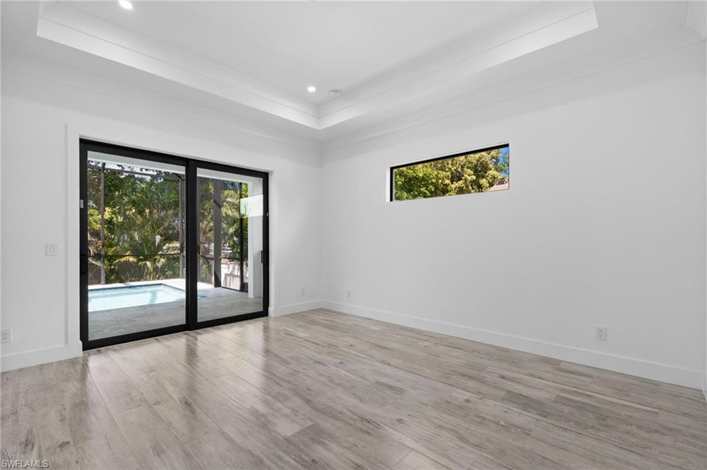 82 Tahiti Road Marco Island, FL 34145 - Photo 17 of 35 Master Bedroom
