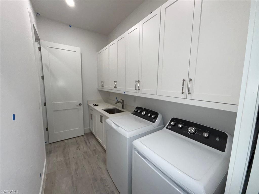 82 Tahiti Road Marco Island, FL 34145 - Photo 21 of 27 a room with storage and utility