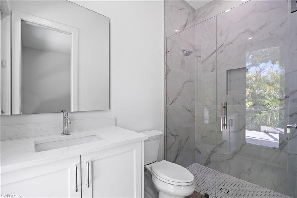 82 Tahiti Road Marco Island, FL 34145 - Photo 23 of 35 Bedroom 2 Bath / Pool Bath