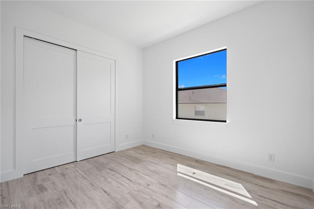 82 Tahiti Road Marco Island, FL 34145 - Photo 25 of 35 Bedroom 3