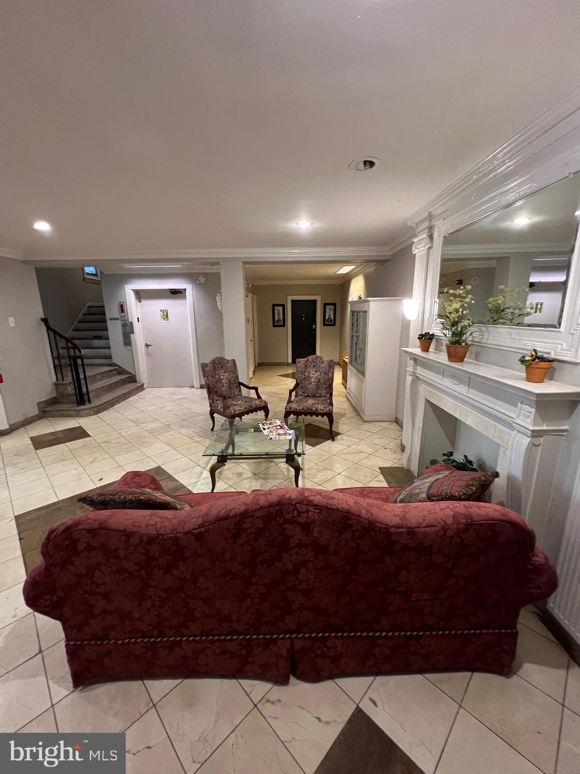 4643 Pine Street, Unit C411 Philadelphia, PA 19143 - Photo 13 of 60 a living room with a couch
