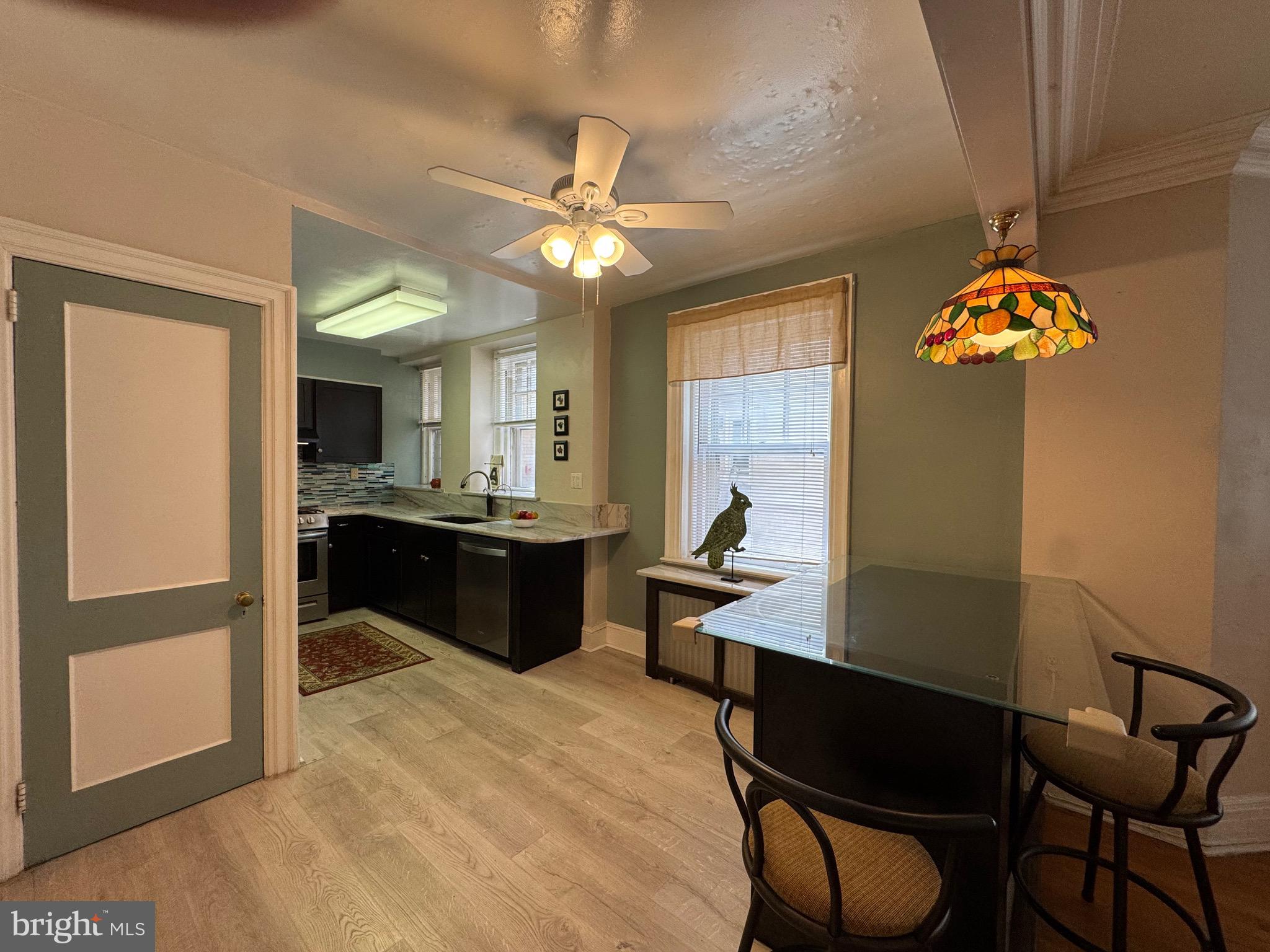 4643 Pine Street, Unit C411 Philadelphia, PA 19143 - Photo 19 of 60 Newer Kitchen, Pantry Closet and Granite Counters