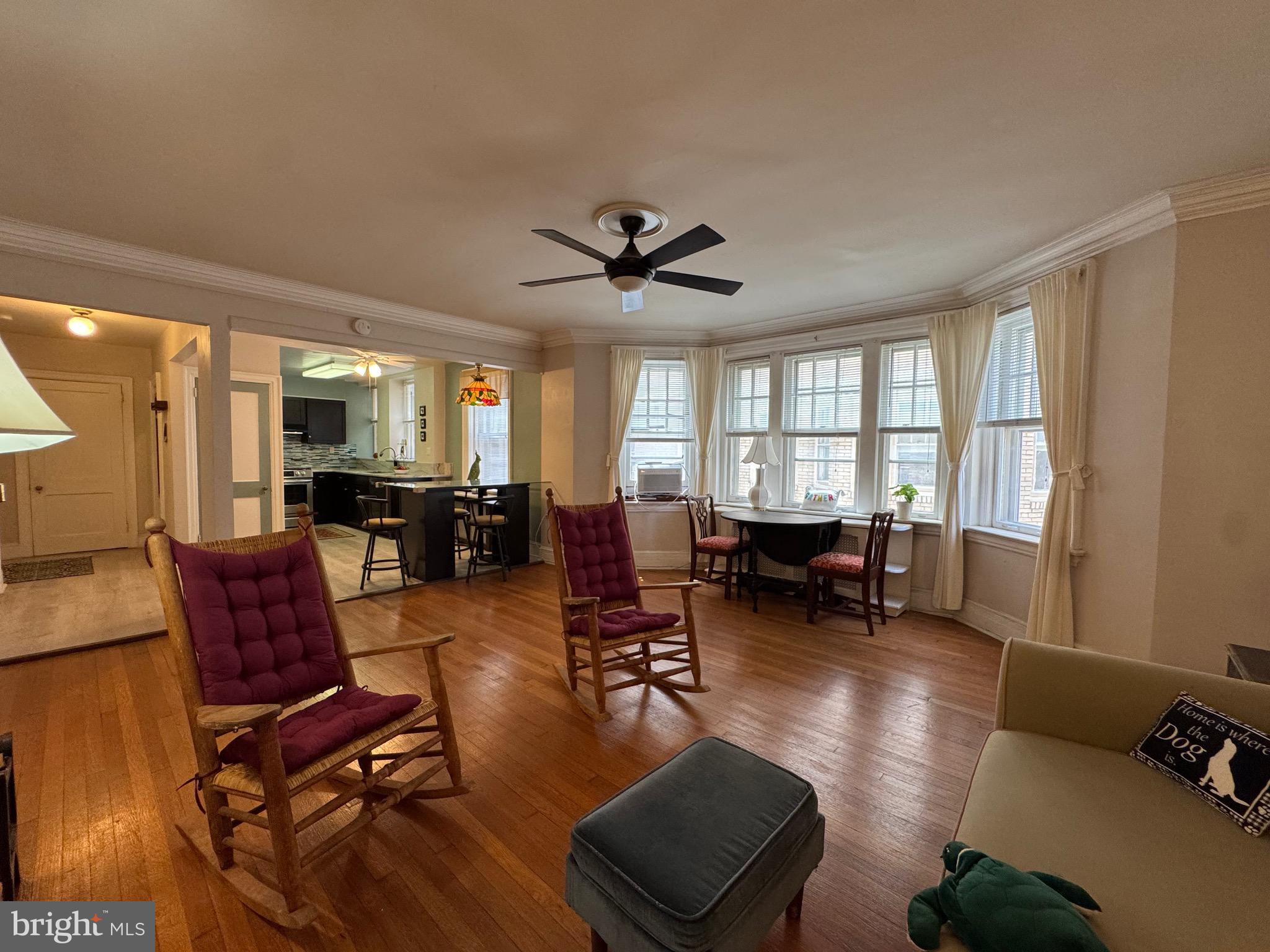 4643 Pine Street, Unit C411 Philadelphia, PA 19143 - Photo 25 of 63 a living room with furniture and a large window
