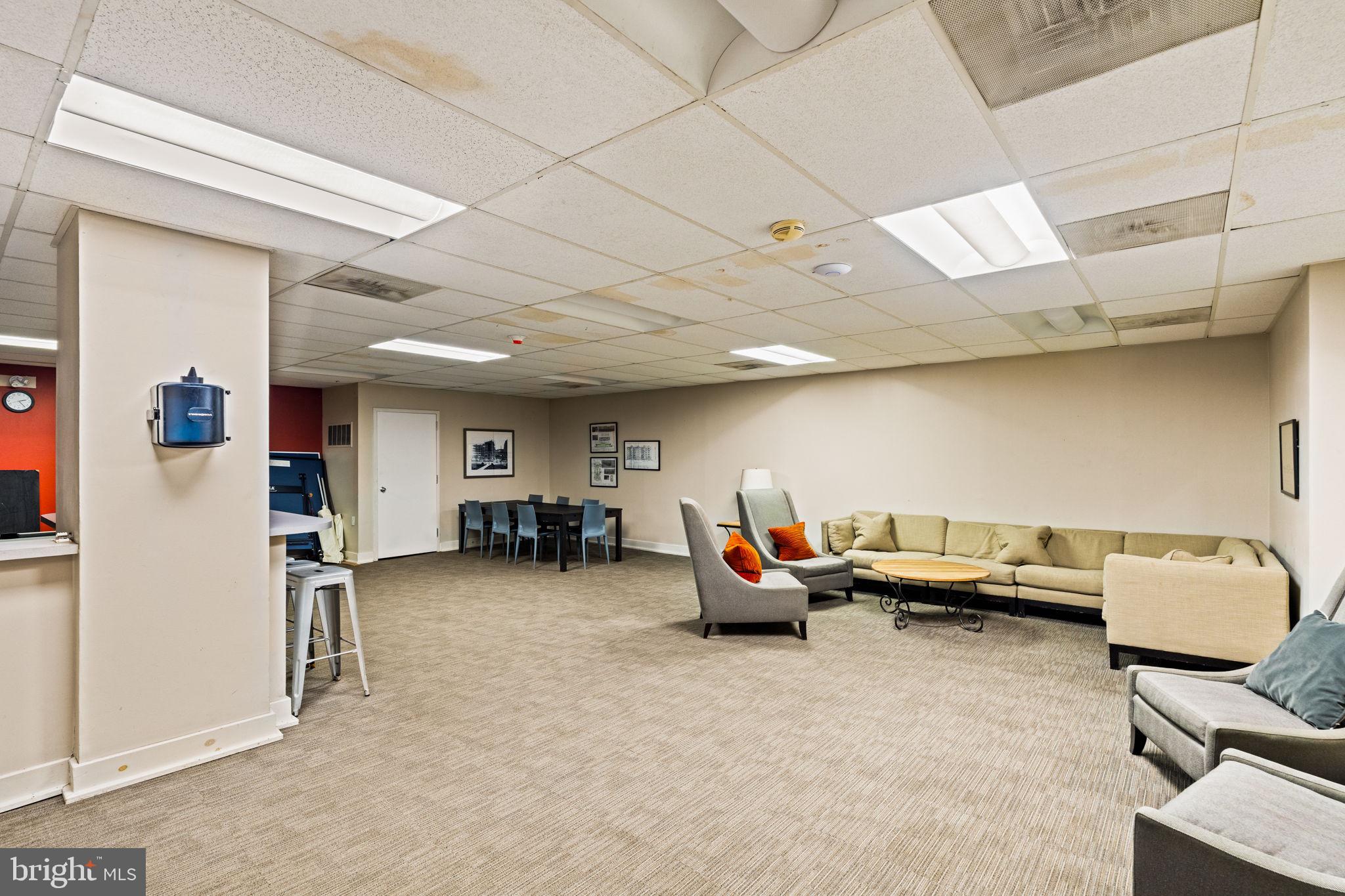 4643 Pine Street, Unit C411 Philadelphia, PA 19143 - Photo 47 of 63 a living room with furniture and a couch