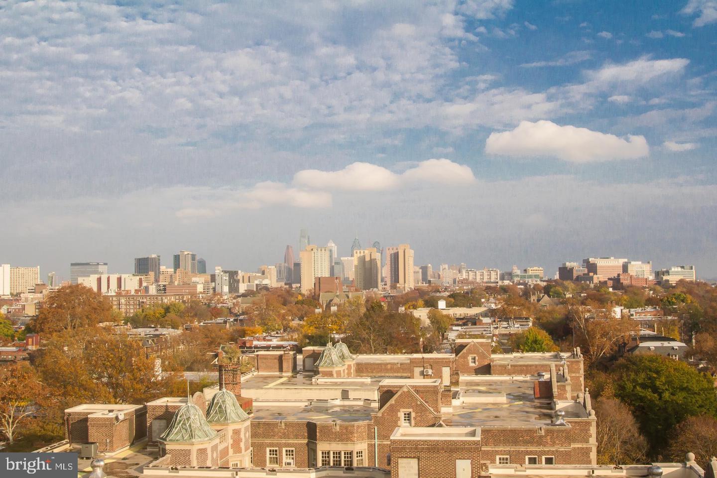 4643 Pine Street, Unit C411 Philadelphia, PA 19143 - Photo 60 of 60 a view of a city with tall buildings