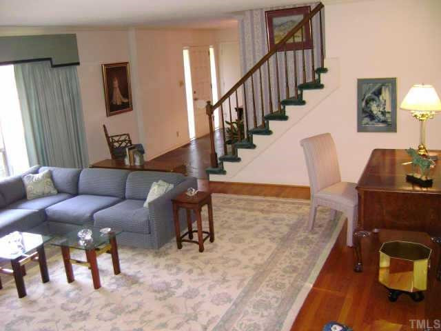 5118 Russell Road Durham, NC 27712 - Photo 4 of 10 Huge living room with masonry fireplace and hardwood floors. Other