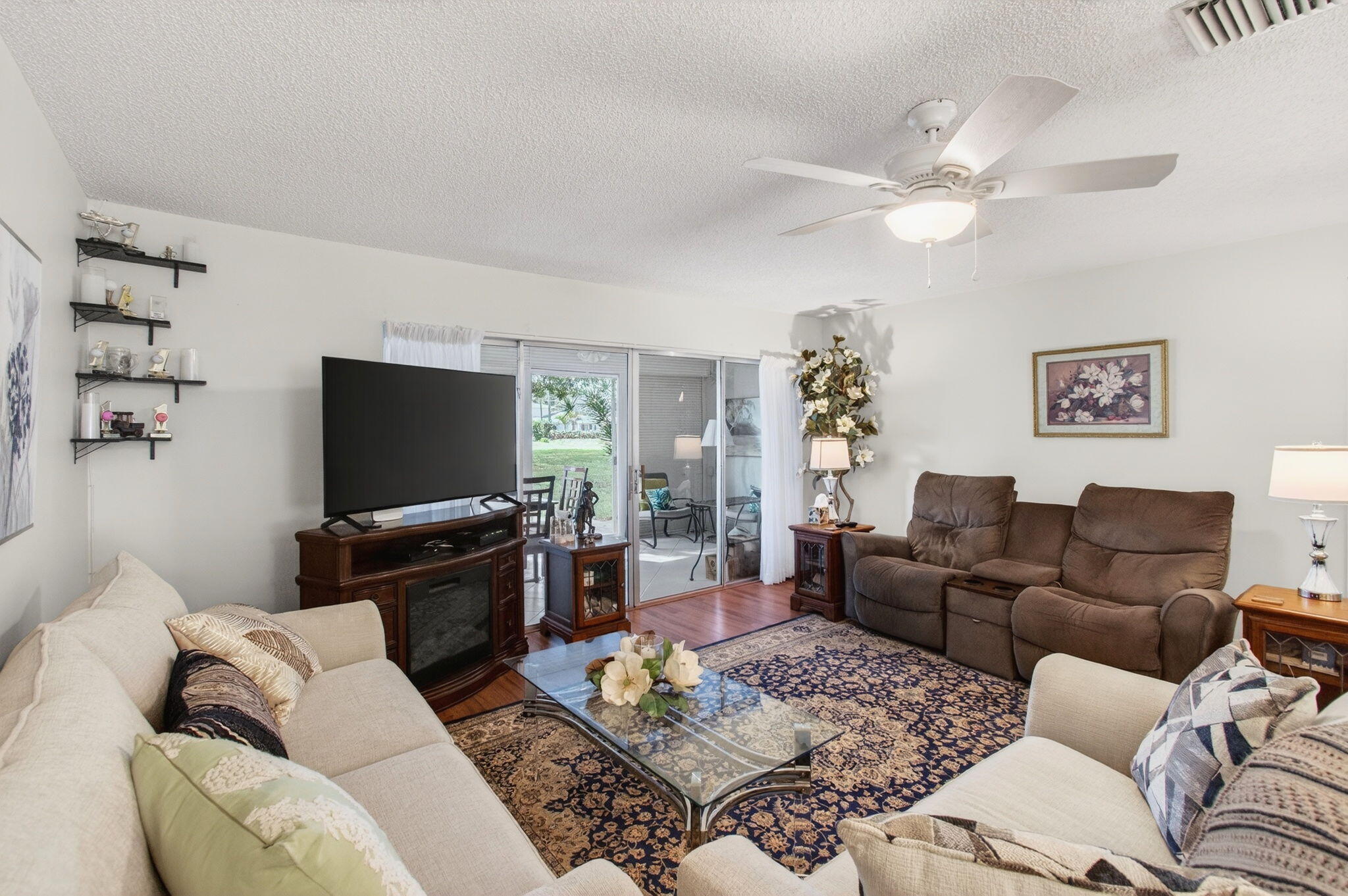 5452 Poppy Place, Unit D Delray Beach, FL 33484 - Photo 15 of 62 Living and enclosed lanai view (4)