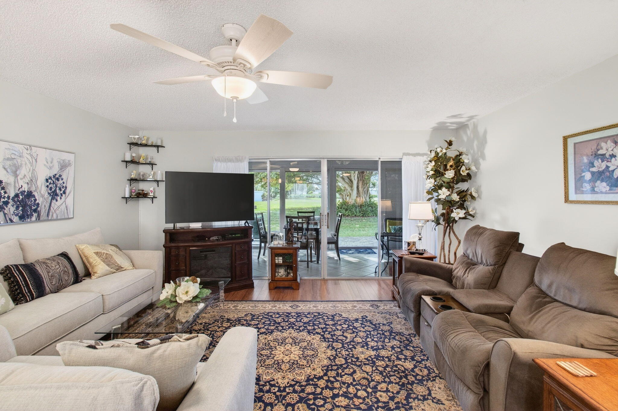 5452 Poppy Place, Unit D Delray Beach, FL 33484 - Photo 18 of 62 Living and enclosed lanai view (3)