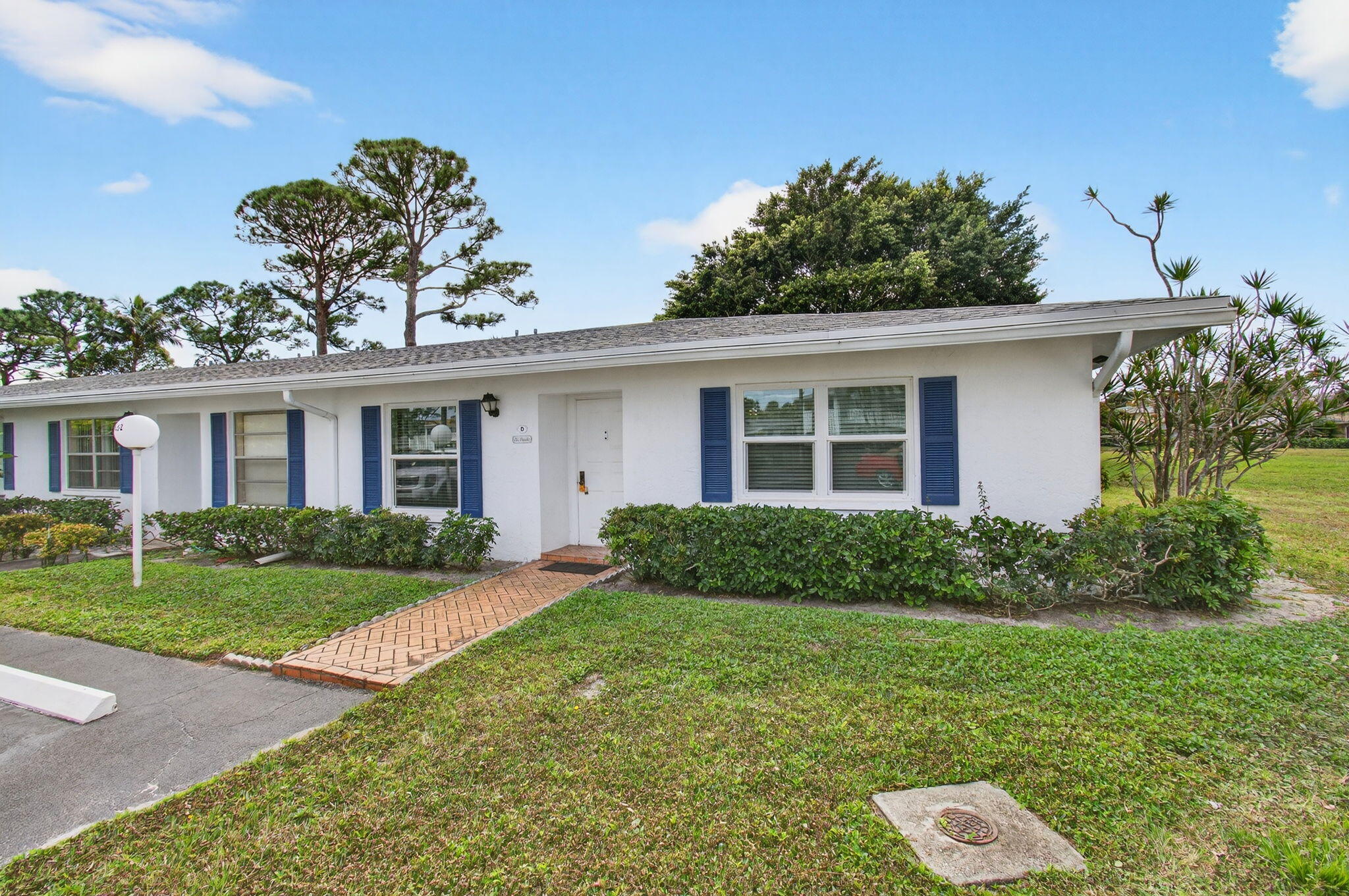 5452 Poppy Place, Unit D Delray Beach, FL 33484 - Photo 2 of 62 Front view of corner villa