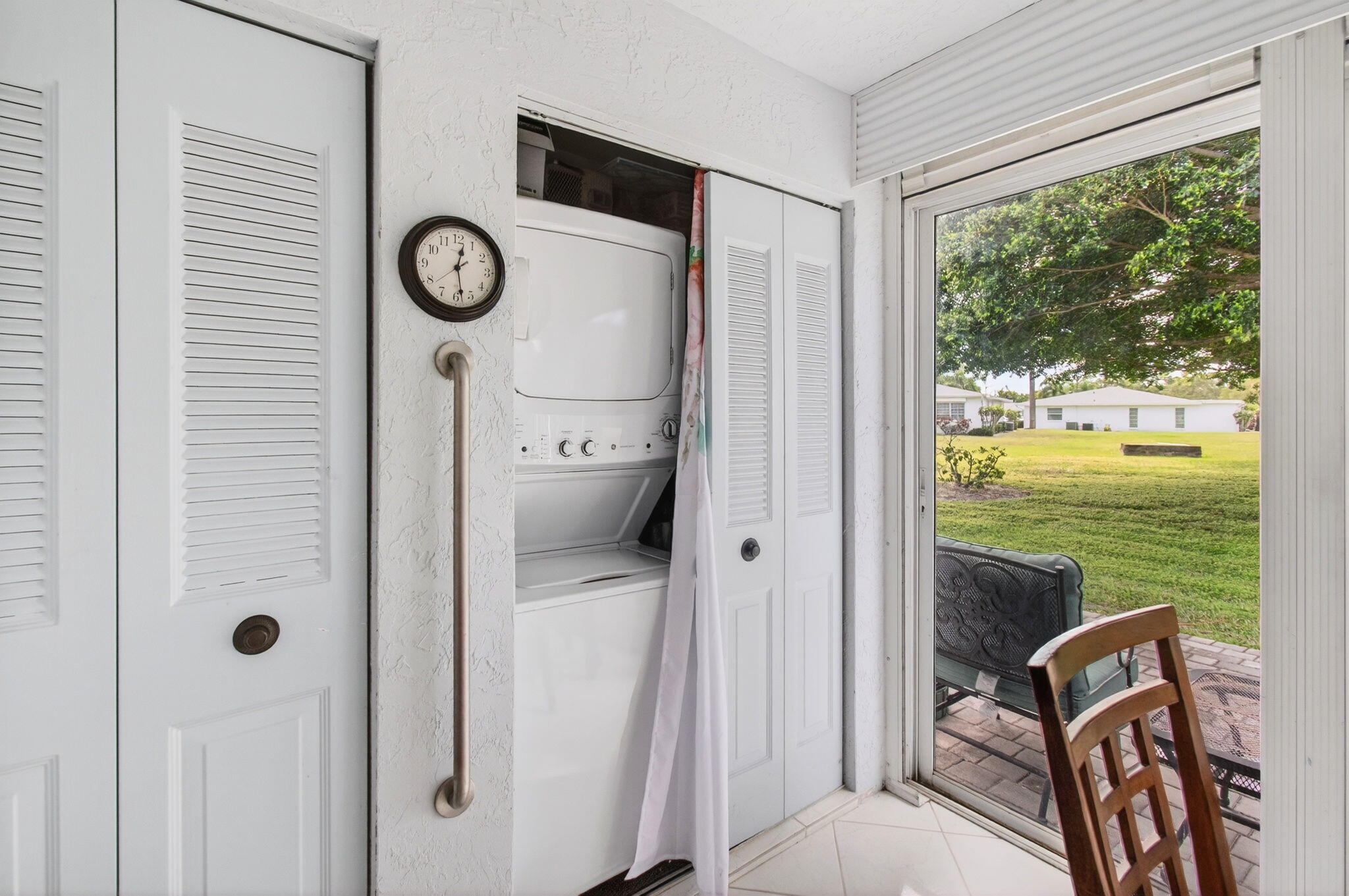 5452 Poppy Place, Unit D Delray Beach, FL 33484 - Photo 25 of 62 Full size stacked washer and dryer