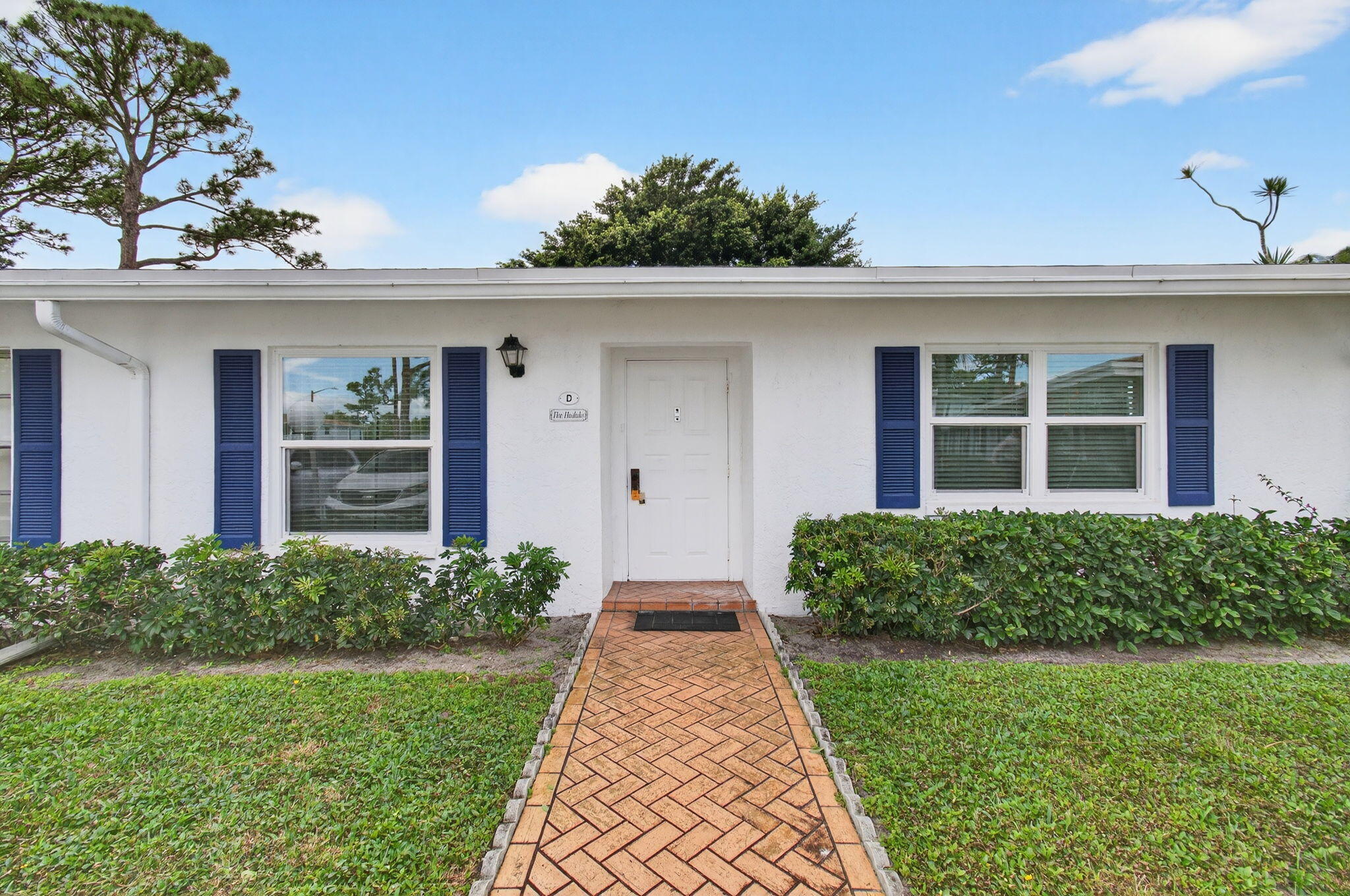 5452 Poppy Place, Unit D Delray Beach, FL 33484 - Photo 3 of 62 Front view of corner villa (6)